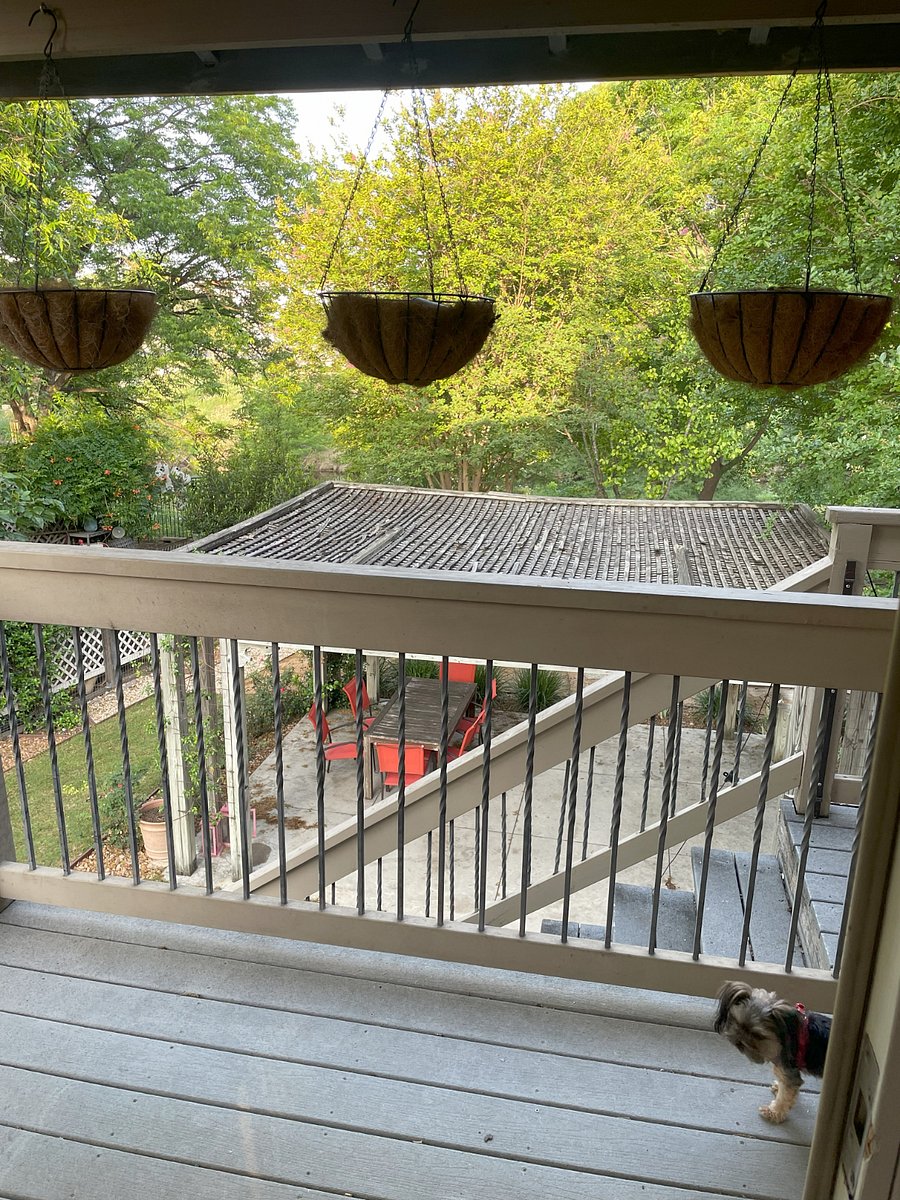 View of patio and sitting area from apartment front door
