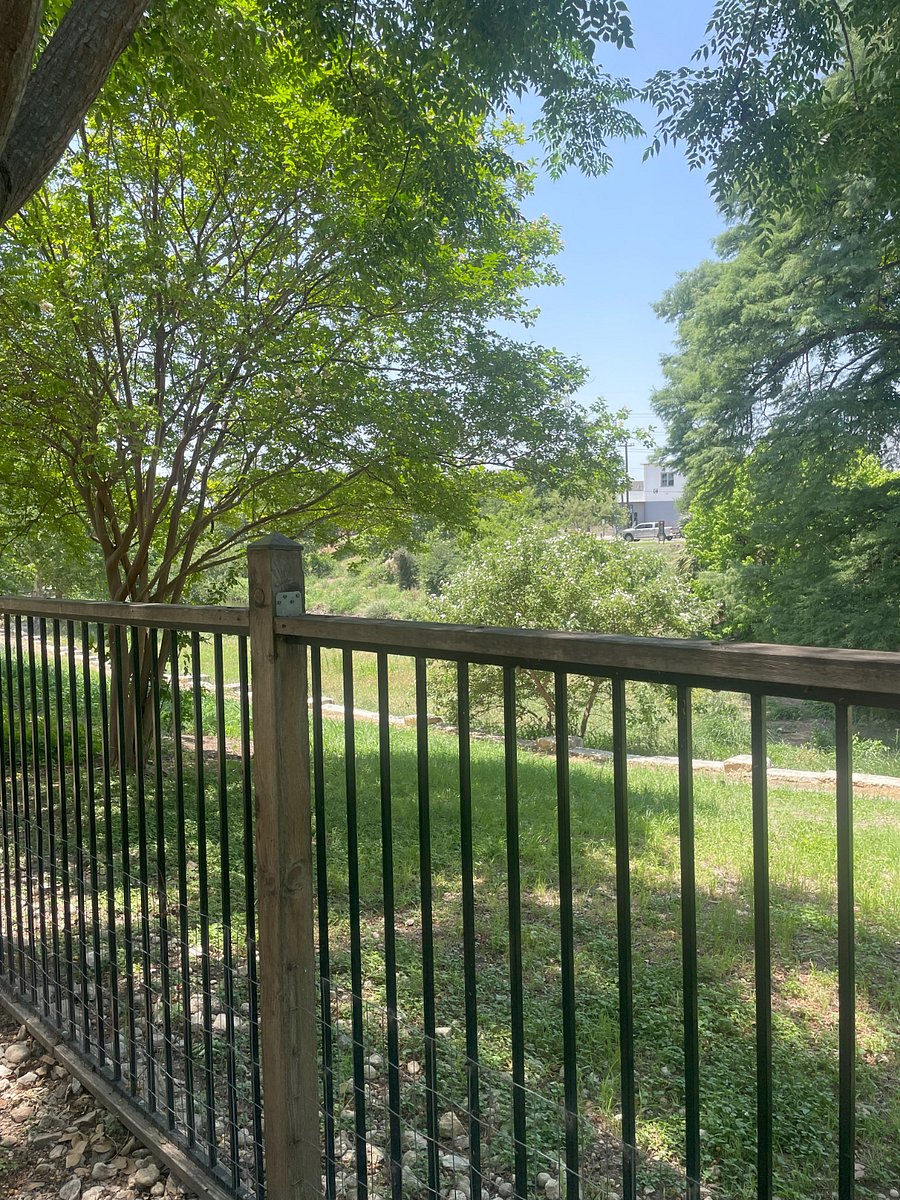 View through backyard gate to San Antonio River
