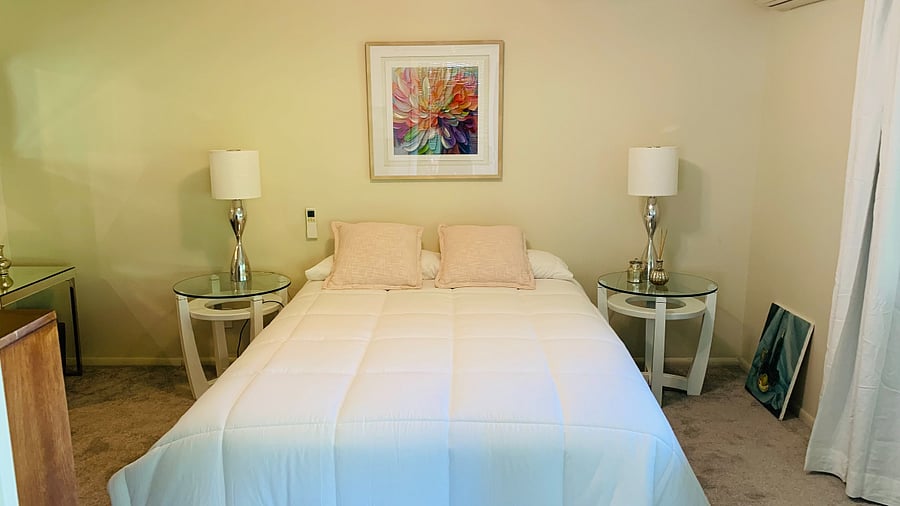 Bedroom has remote controlled ceiling fan and Daikin heater/air conditioner. 