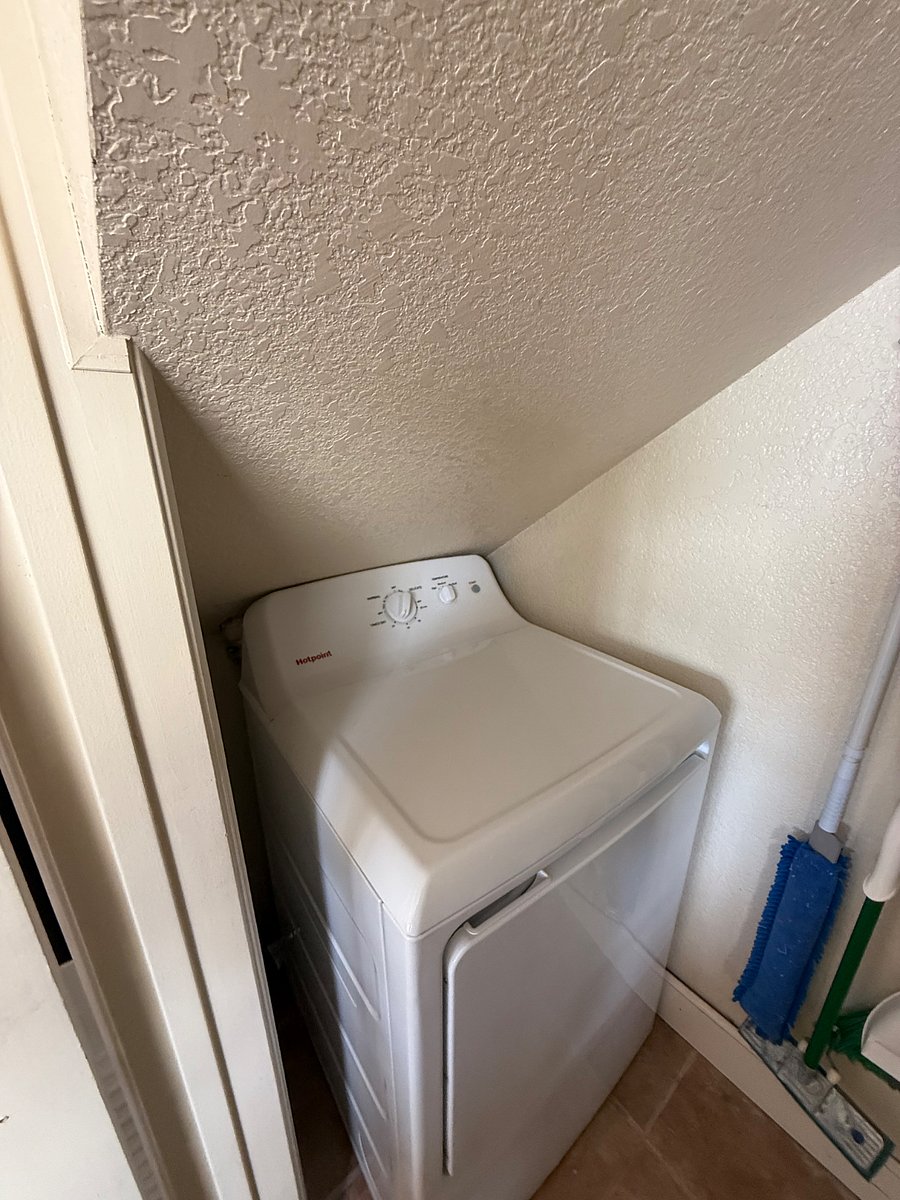 Laundry closet with washer and dryer