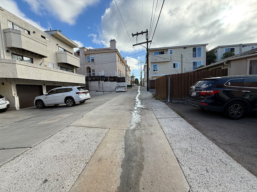Side view of parking spot with view of the alley access