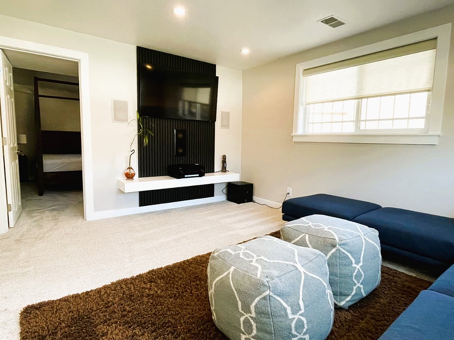 Downstairs Entertainment Room with TV and Sound System