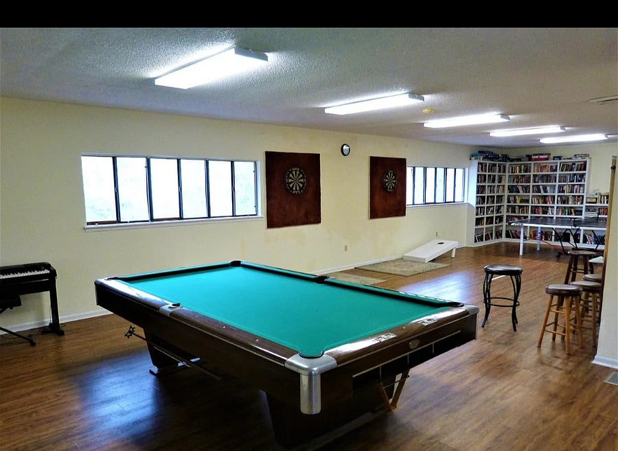 Across by the pool in the clubhouse.