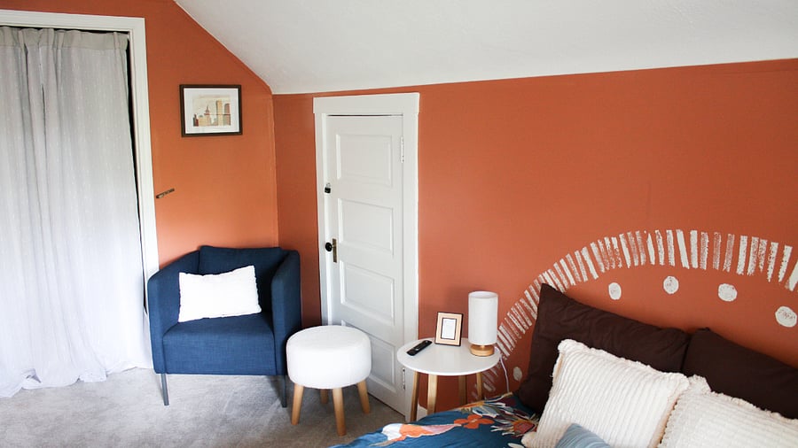 A cozy armchair complete with a super soft foot rest awaits you after a long day!