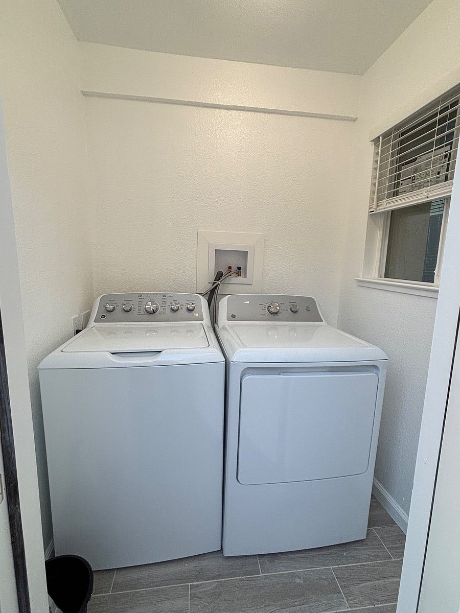 Laundry Room adjacent to unit.