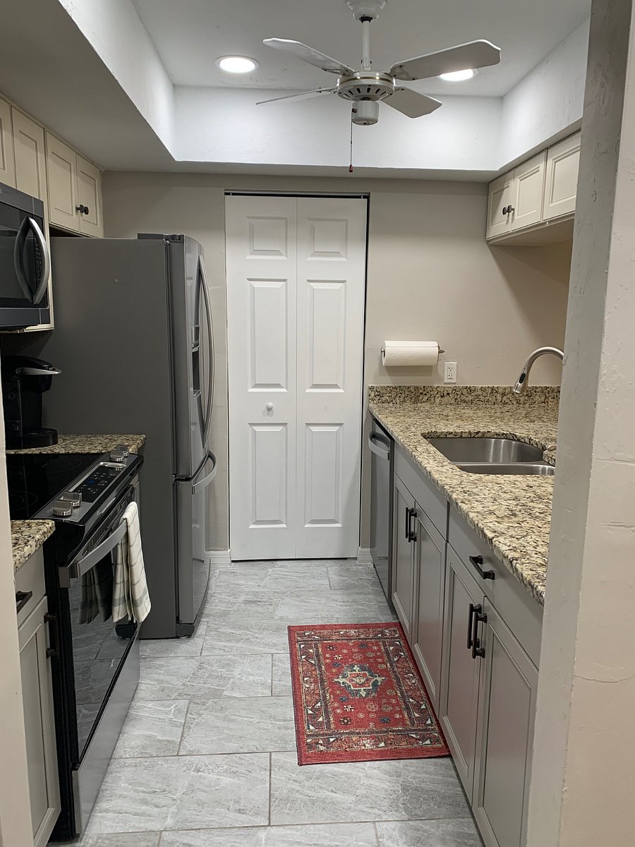 Kitchen and door to full size laundry area!
