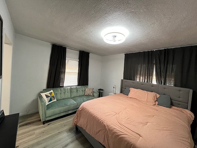 Master Bedroom with King bed and pull out love seat