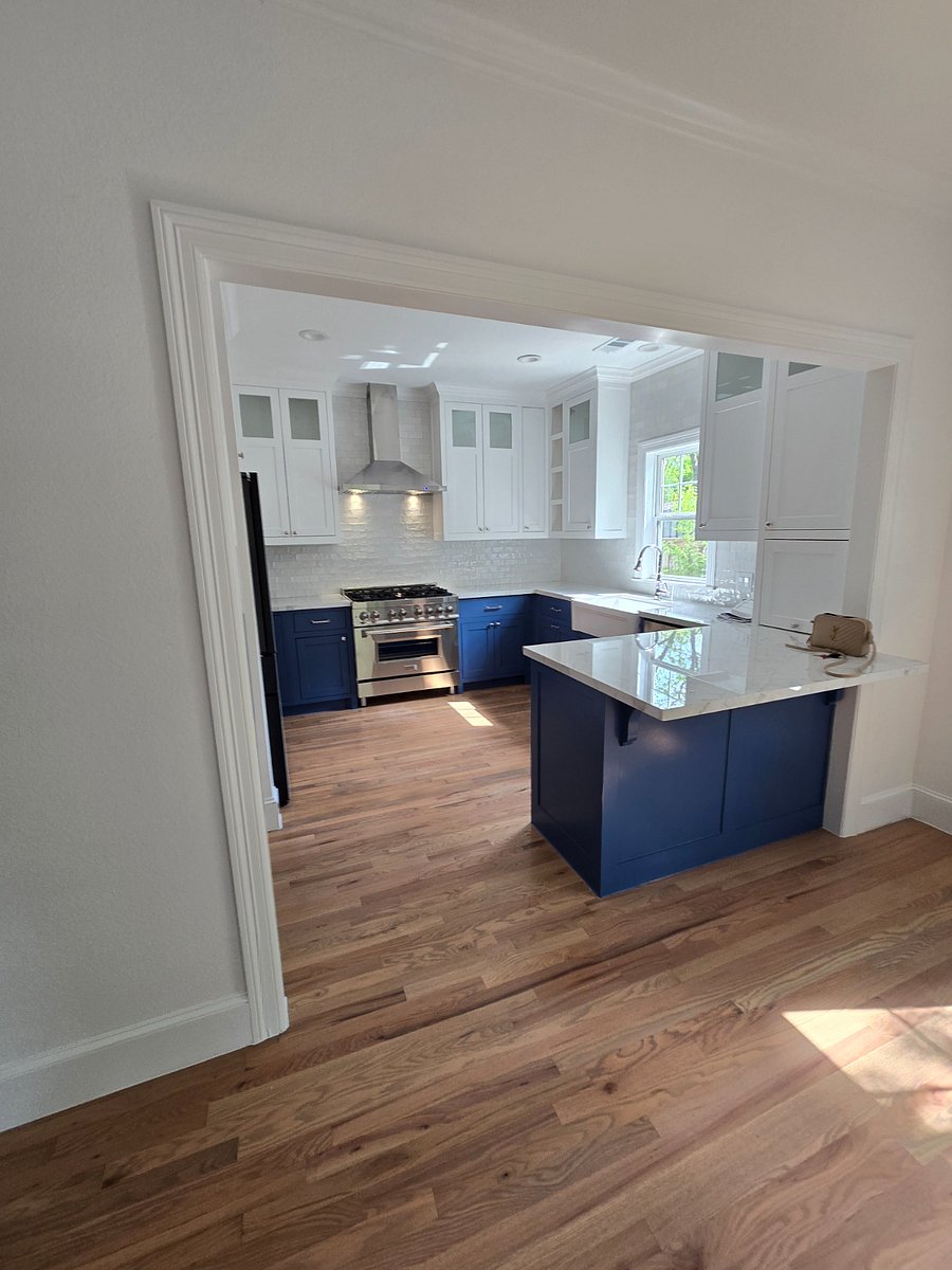All new appliances in quaint remodeled kitchen with original 1942 oak floors. 