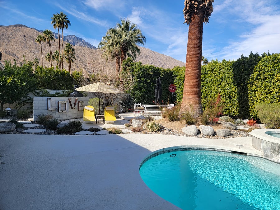 BBQ and pizza oven behind the LOVE sign.