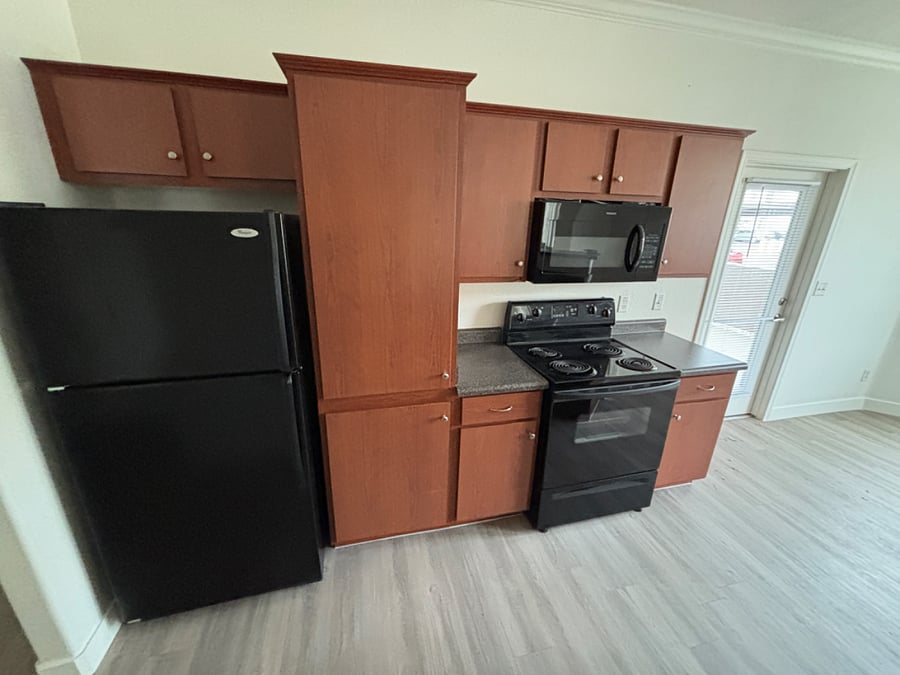 Kitchen with pantry, full-size appliances and plenty of counter space.