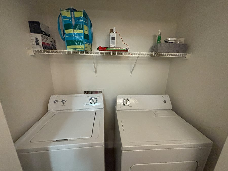 In-home full-size washer and dryer, iron, and starter laundry supplies.  