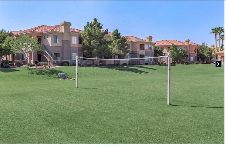 Community grass volleyball court.