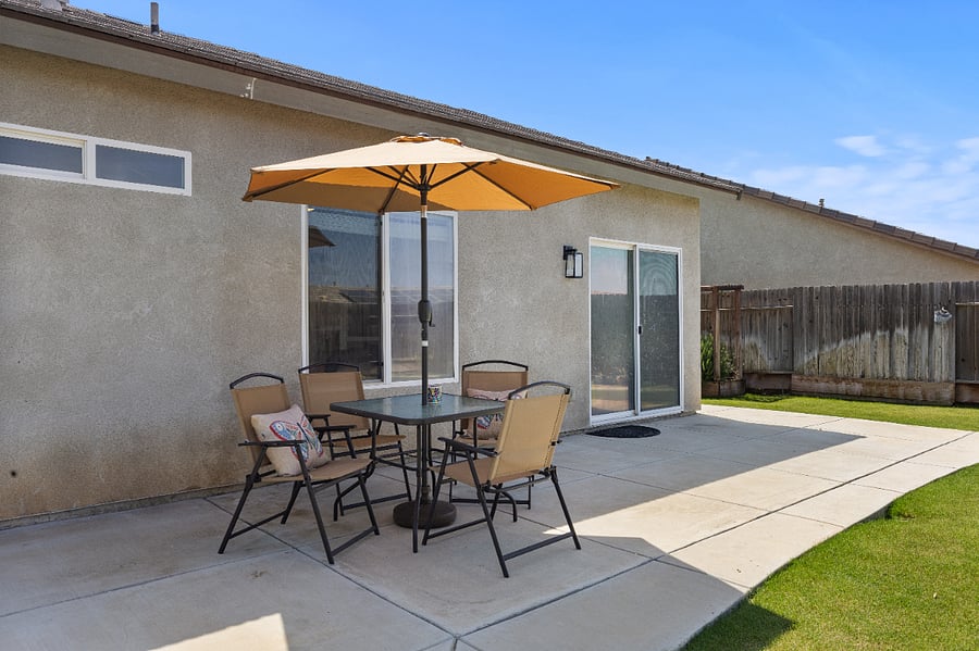 Private patio with outdoor seating, perfect for morning coffee or evening wine 