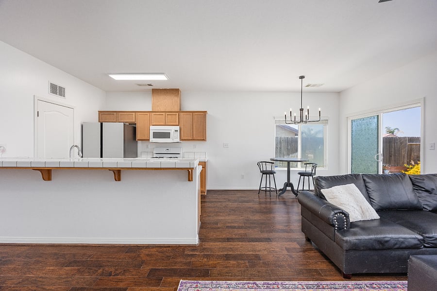 Spacious layout with seamless flow from living room to kitchen