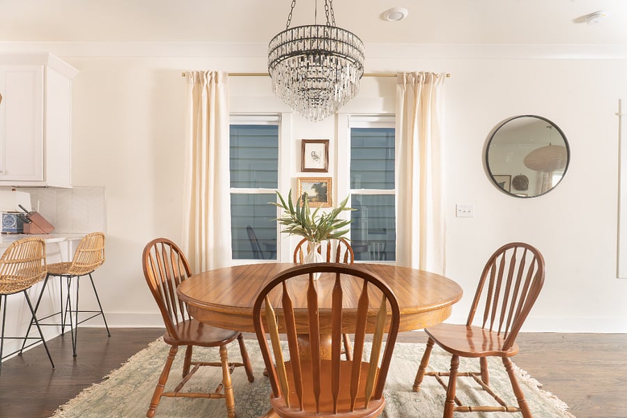 Dining table for four plus bar seating for three. Open to the kitchen and living room