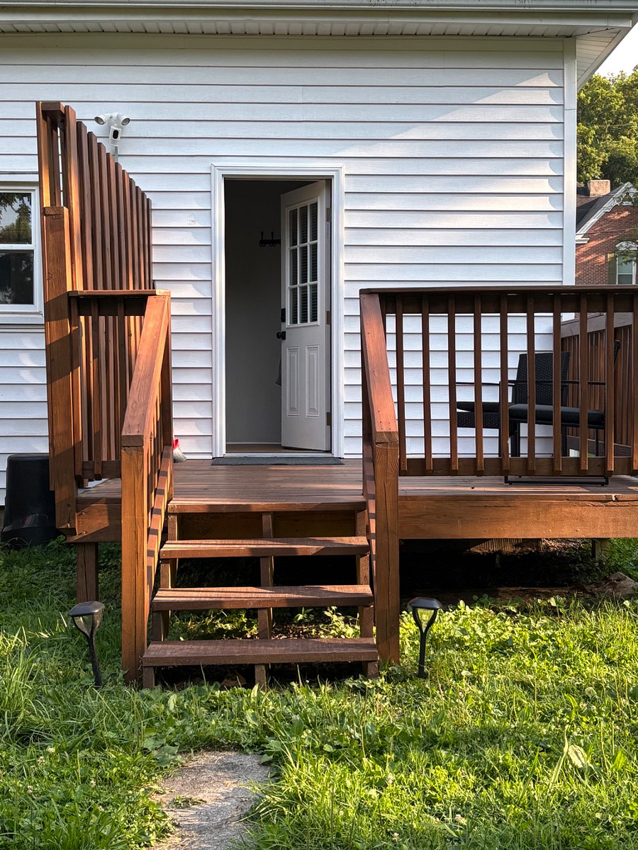 Rear deck with solar lighting for ambience at night. Has a rear floodlight from dusk to dawn with security camera pointed towards parking area.