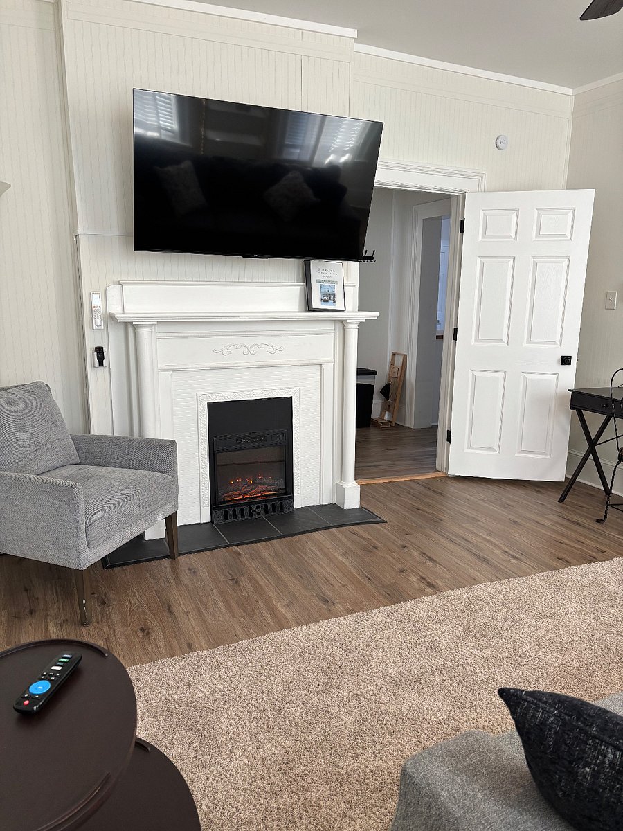 Living room with electric fireplace and 50" Smart TV