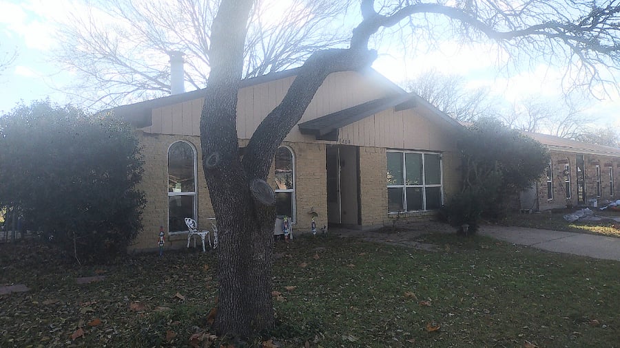 The house is on a corner lot that provides plenty of parking.