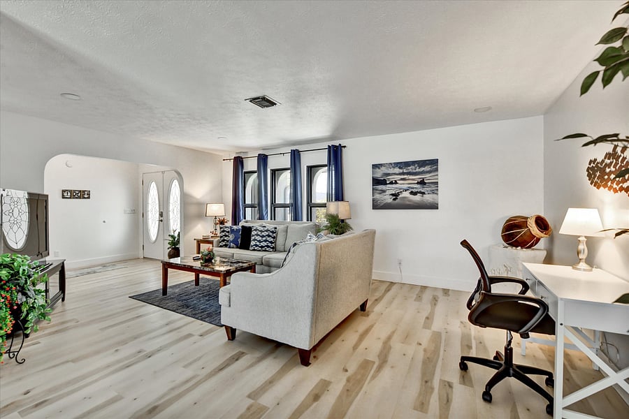 Front living area with desk and TV
