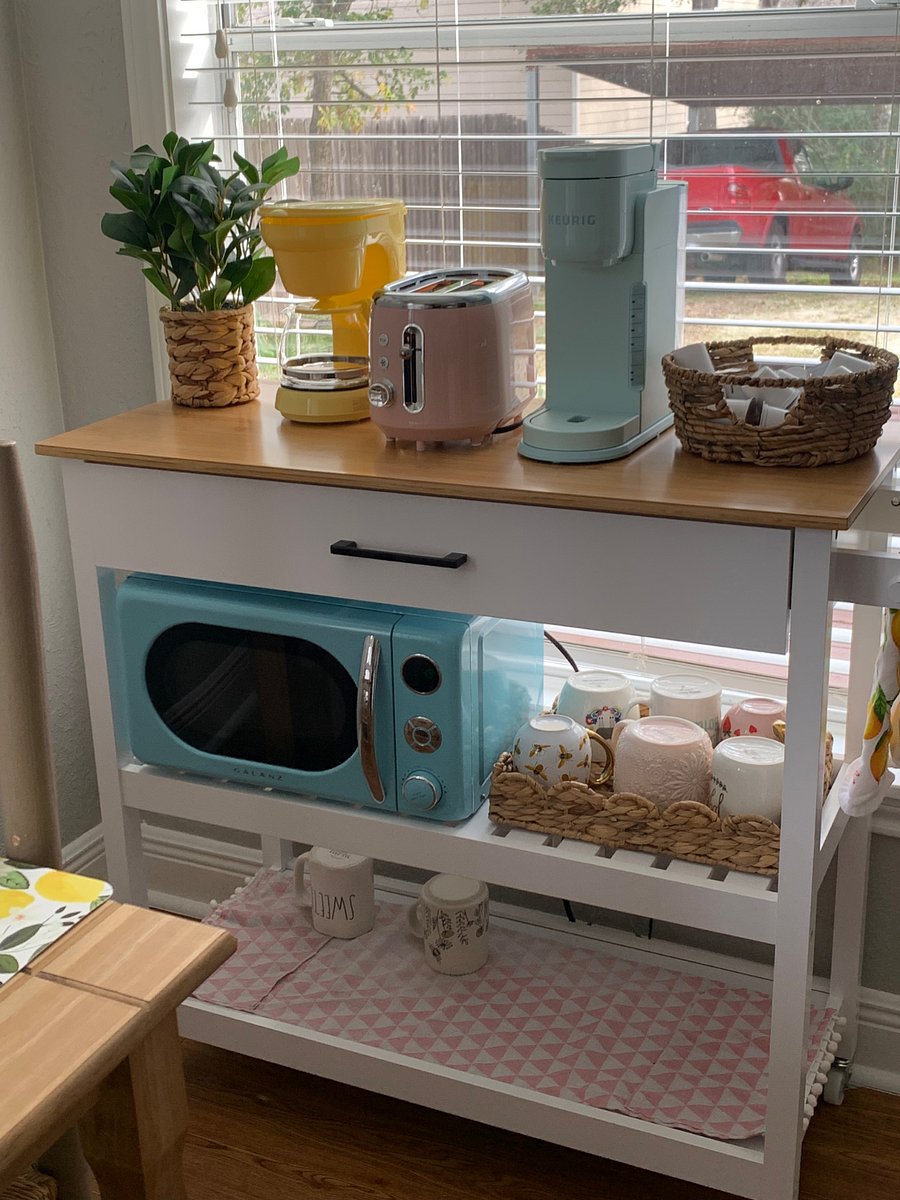 Coffee bar and microwave.