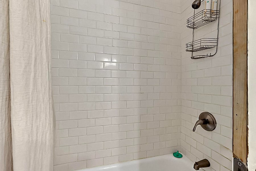full hall bathroom with tub