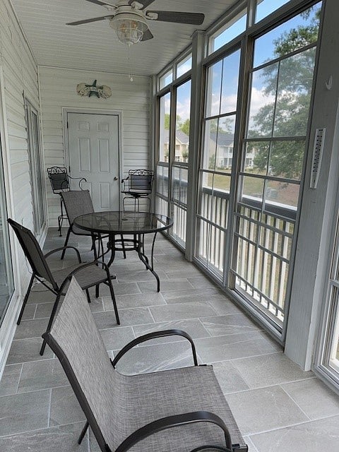 Enclosed patio overlooking the golf course.