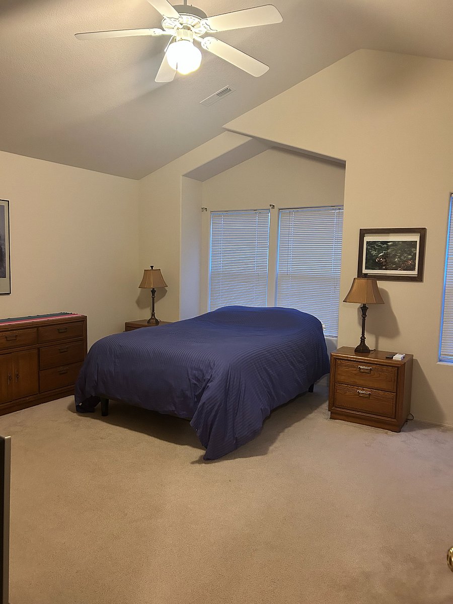 Large Master Bedroom, King sized bed with Serta adjustable mattress, walk in closet and individually controlled heat and A/C