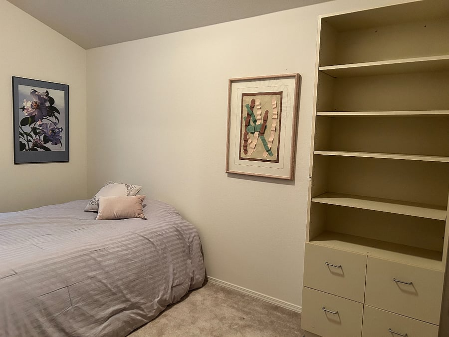 Second Bedroom with comfortable Queen Bed, closet and shelves/dresser