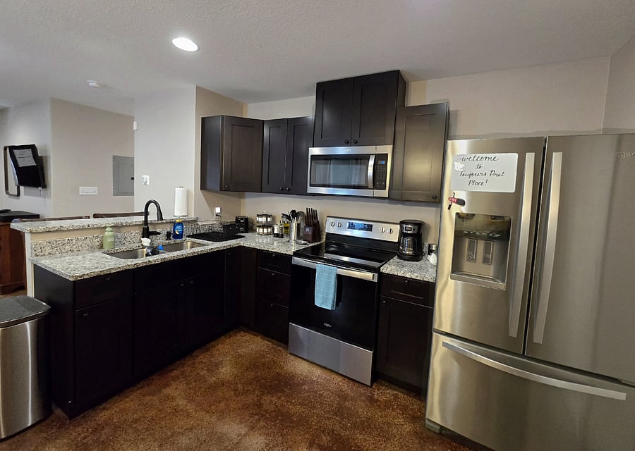 Whether you're cooking a full meal or brewing a cup of coffee, the kitchen has what you need! You'll find basic utensils and spices here.