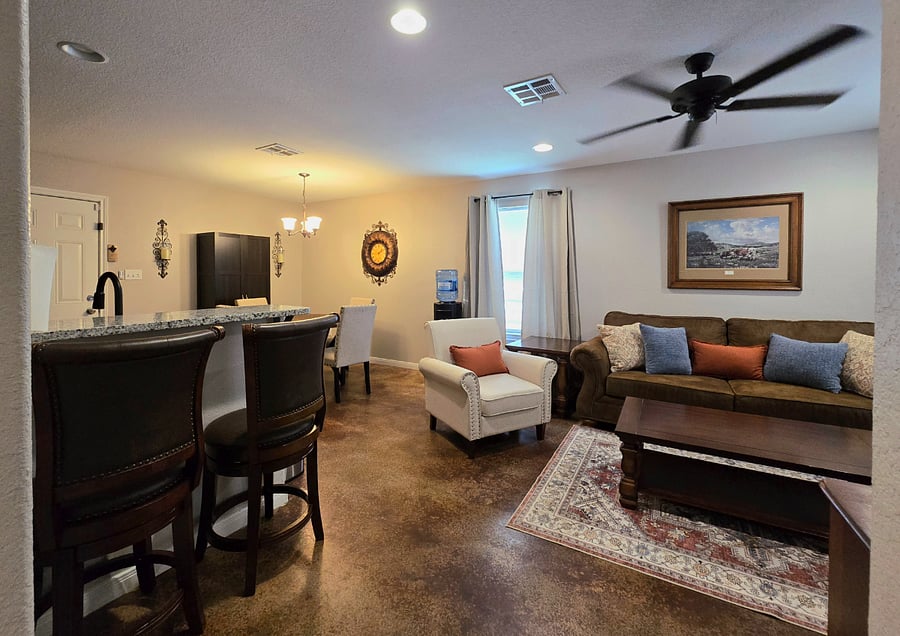 Dine, and unwind in the comfortable and functional living and dining areas