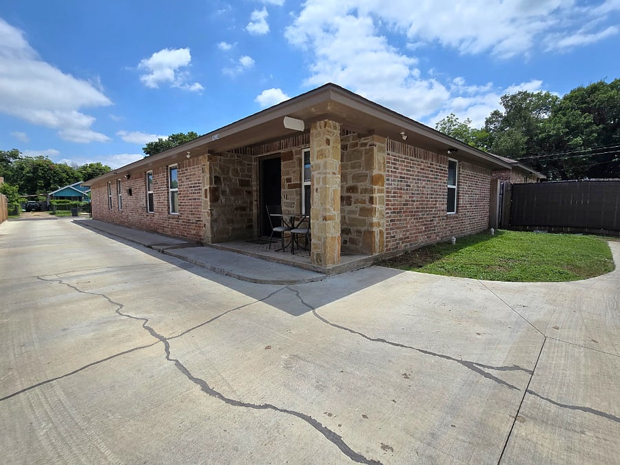 The driveway will bring you to a private patio- welcome home!