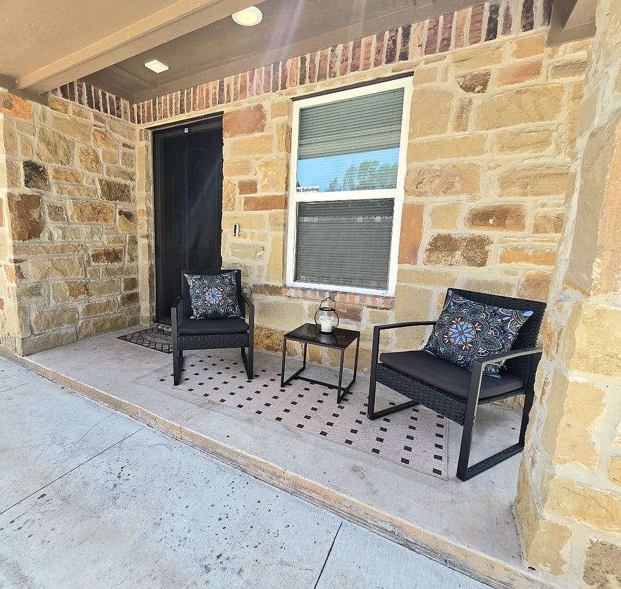Whether you're looking for a quiet retreat or a gathering place, the inviting covered porch is ready for you!
