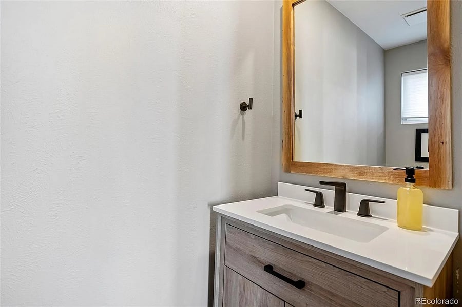 Half bathroom across from the front door in the entryway
