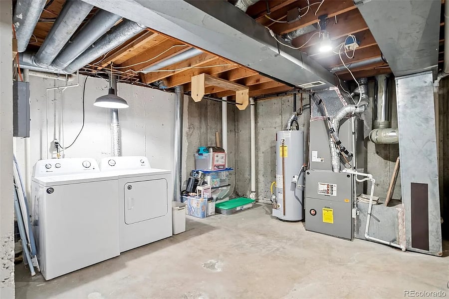Basement with laundry and additional storage space