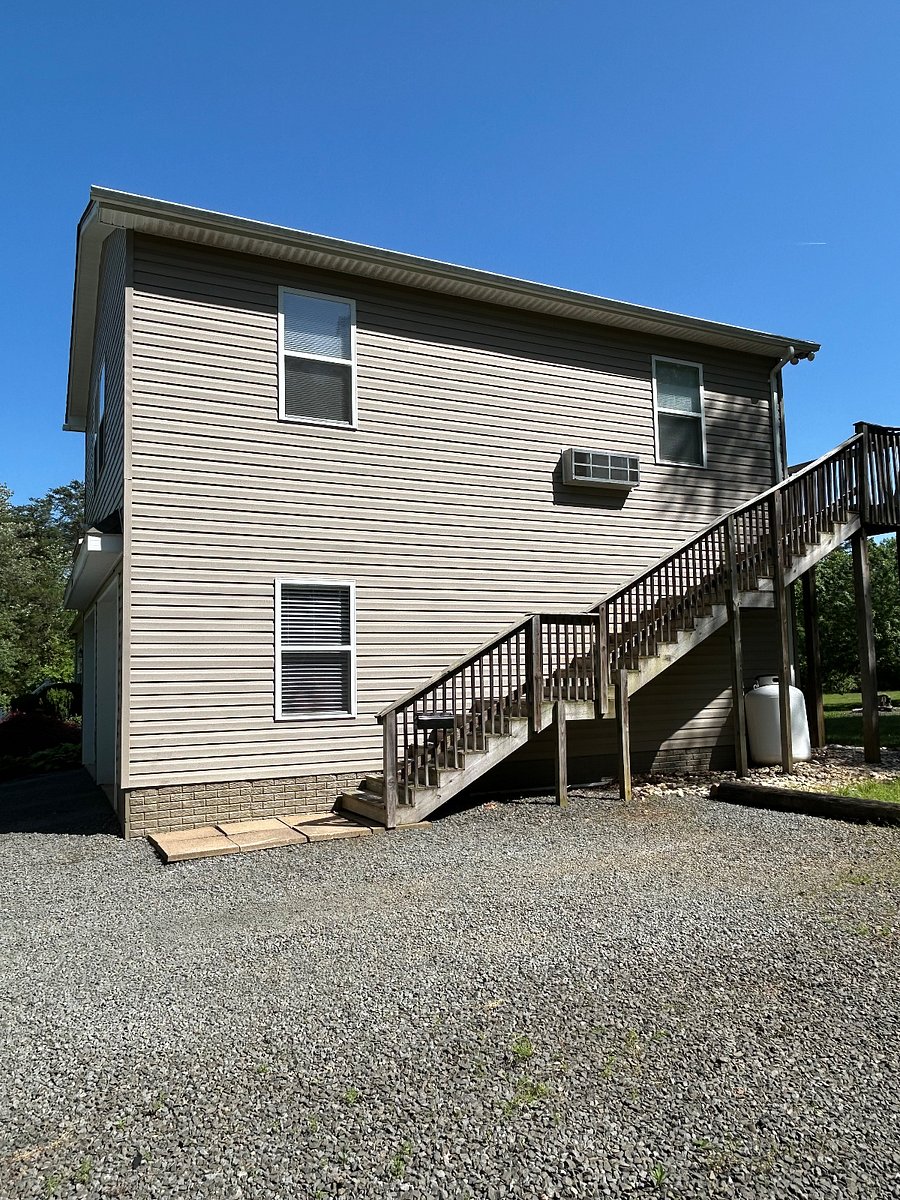 Stairway to apartment. Ample dedicated parking next to stairs