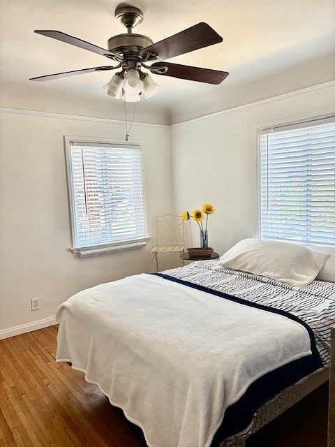 Available bedroom with ceiling fan, closet, table and chair, Wifi, and storage