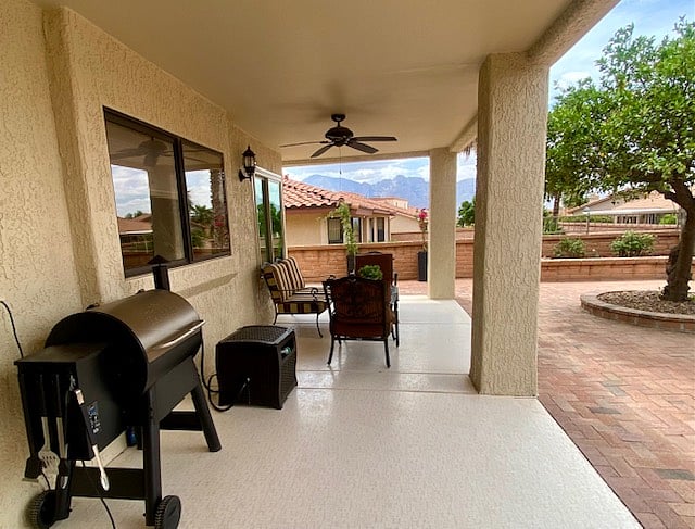 Grill and patio furniture with views of the Catalinas
