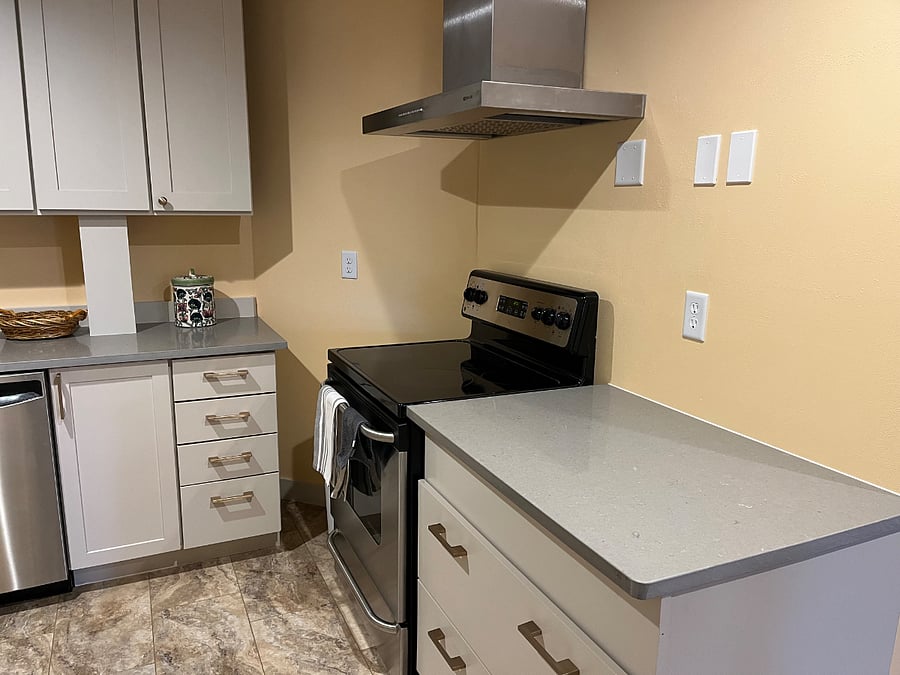 Electric stove and hood.