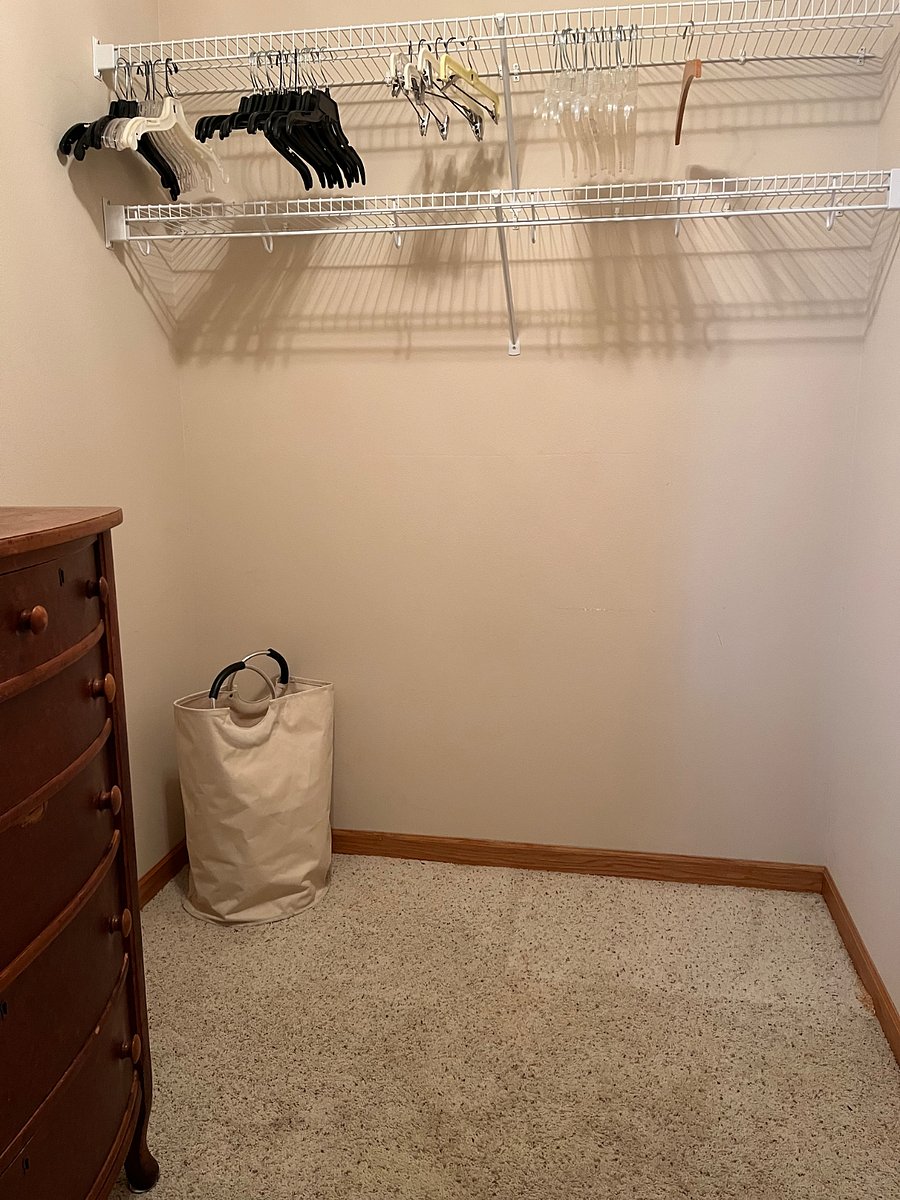 Walk in closet and chest of drawers for second bedroom.