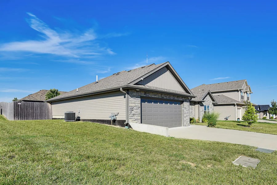 Keyless entry and security camera offer safety and convenience. Step-free access into a peaceful Columbia home.
