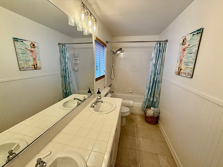 secondary bathroom double sink/bath and shower