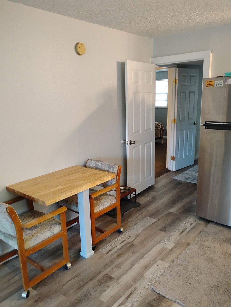 Hallway door separating back half and front half condo.