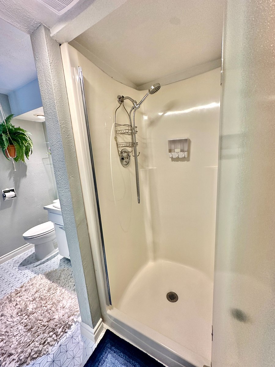 Handheld adjustable shower sprayer and starter shampoo, conditioner, body wash dispenser is added for your convenience.