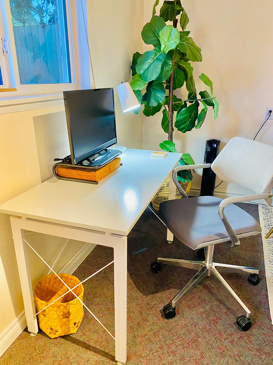 Work space with an ergonomic Steelcase desk chair for your comfort. 