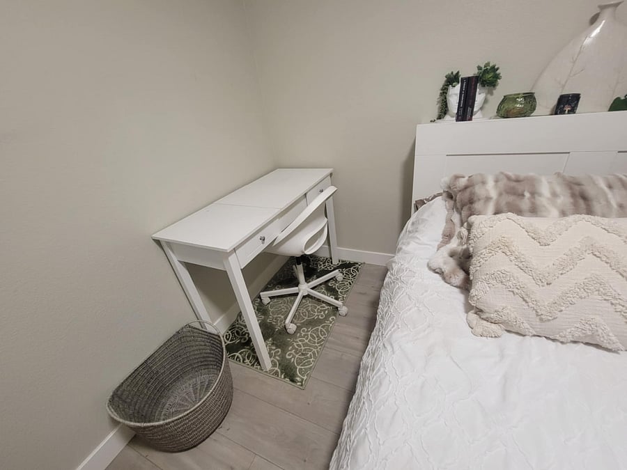 The desk is also a vanity. The mirror folds up to give storage.