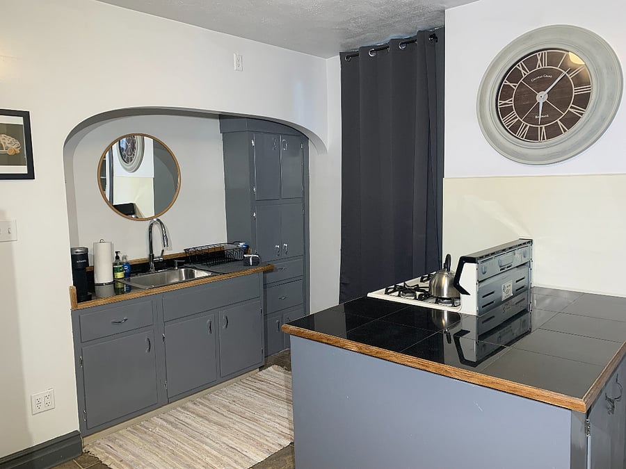 Fully stocked kitchen with cookware, and everything you need to cook at home.