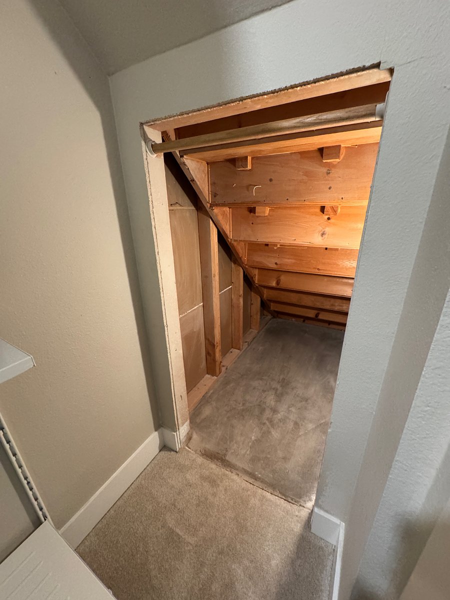 Extra storage space inside bedroom closet.