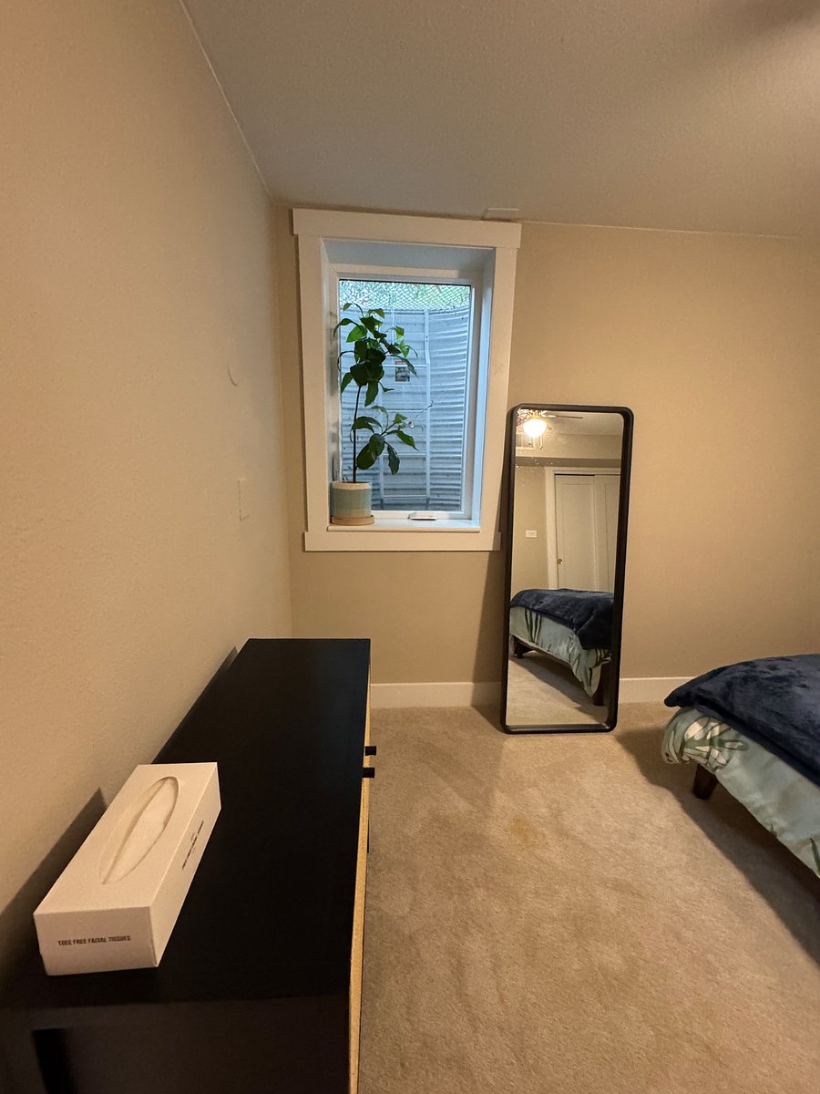 Egress window. 
Not pictured but included: Black out curtain.