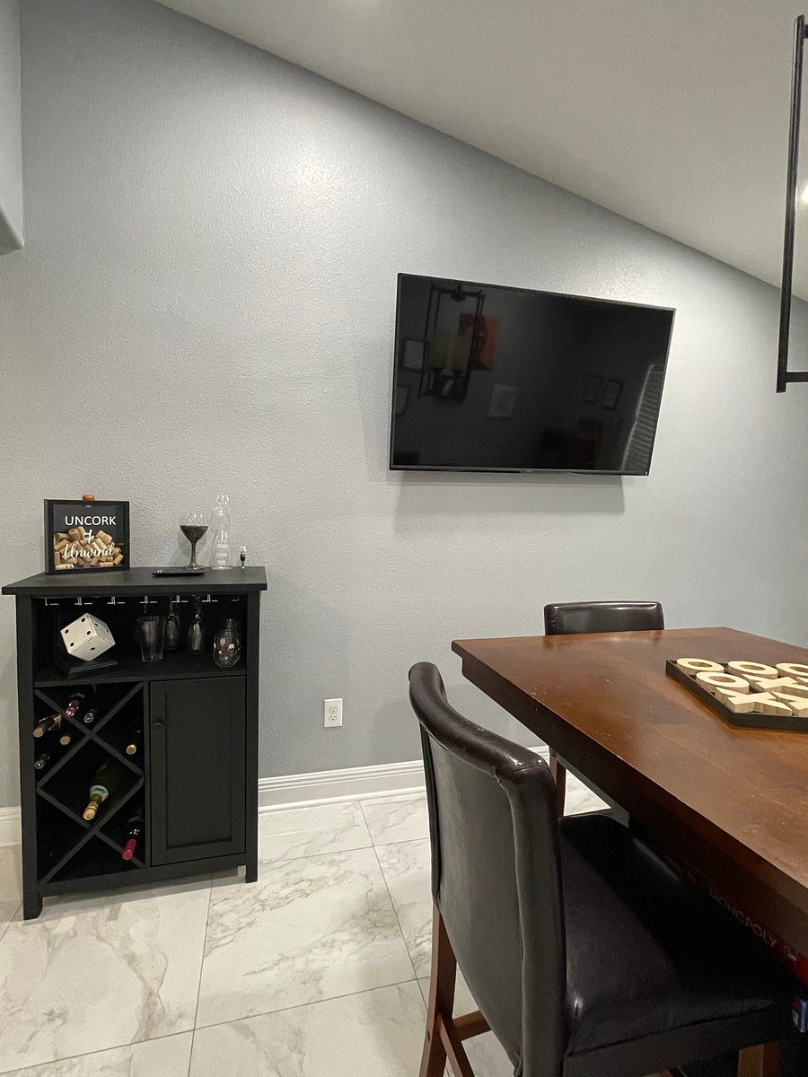 Wine cabinet and SMART TV in the Pub room