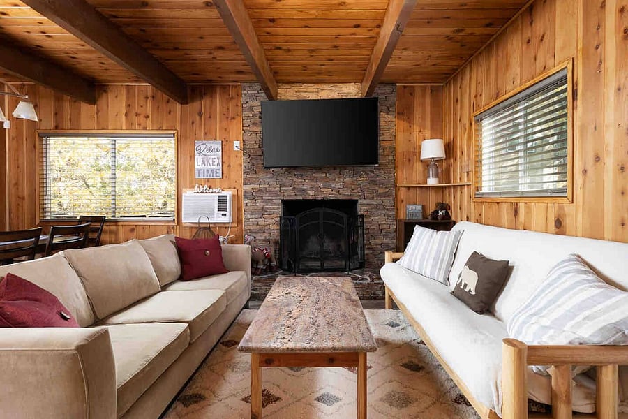 Enjoy the best of both worlds with the wood burning fireplace and extra large smart TV - the futon folds out for an extra sleeping space